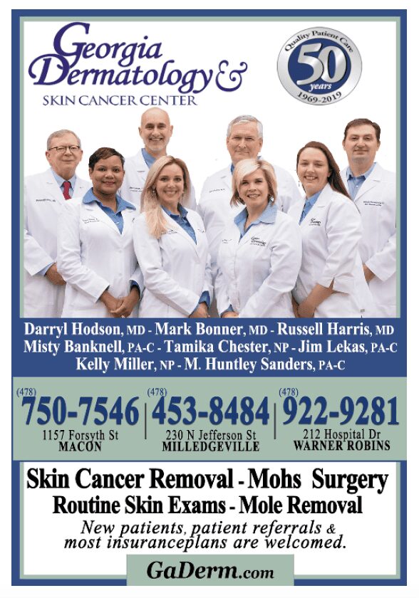 Dermatology team group photo, clinic contact details.