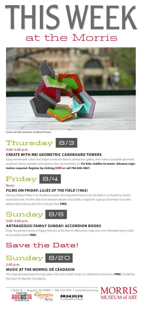 Colorful geometric cardboard sculpture on wooden table
