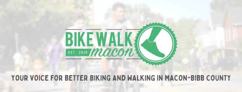 Bike Walk Macon logo with cycling background.