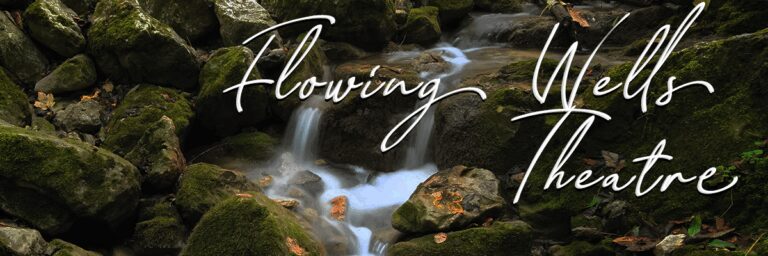 Flowing Wells Theatre text over forest stream.