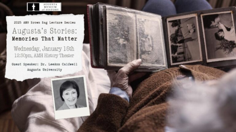 Person looking at vintage photo album.