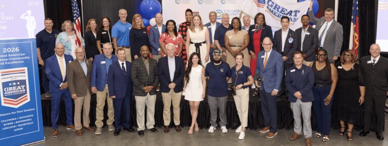 Large diverse group posing at community event